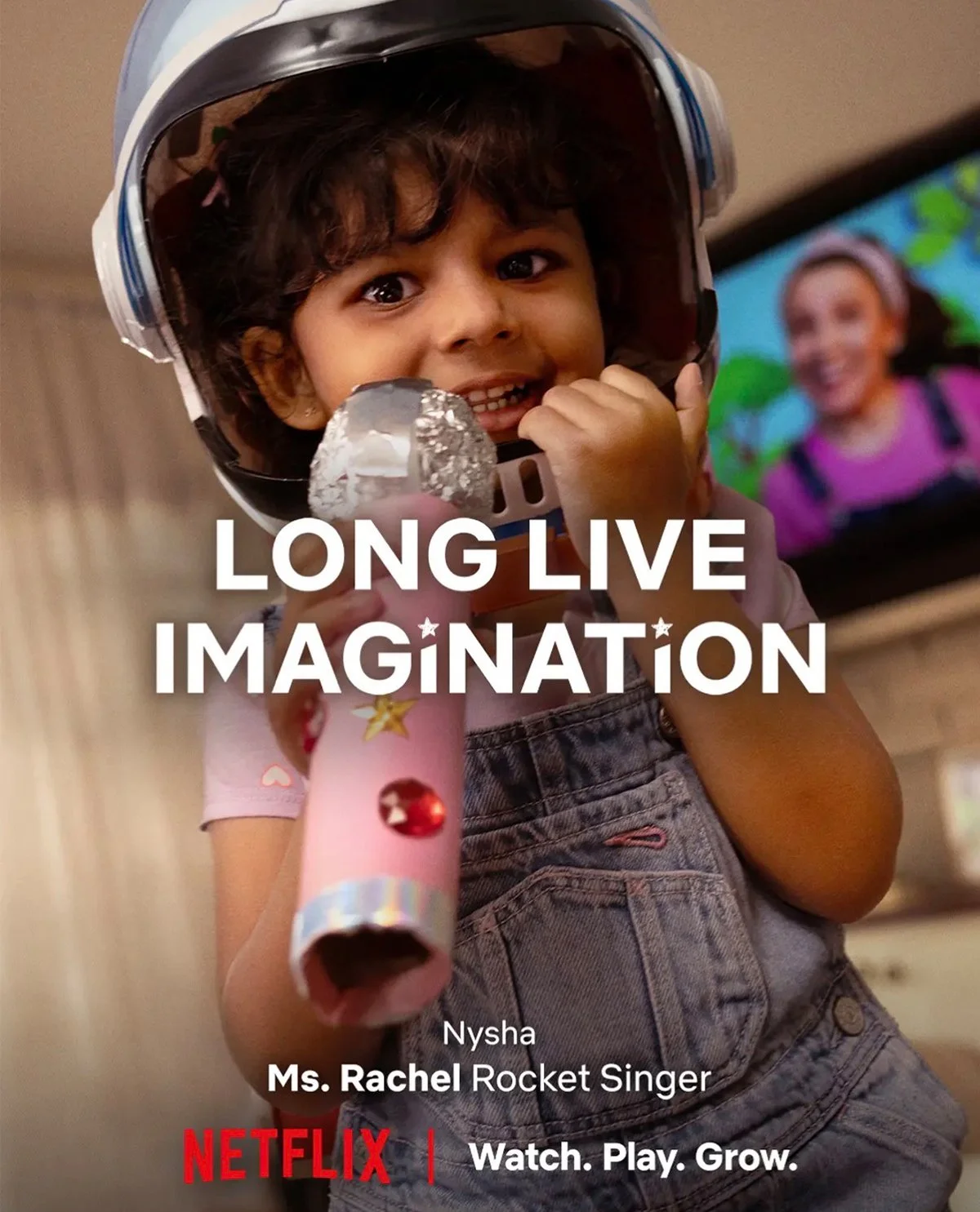 Cover of a Netflix show titled 'Long Live Imagination' featuring a young girl with curly hair wearing a space helmet and holding a cardboard rocket. Background includes a TV screen showing a smiling woman. Text includes 'Nysha, Ms. Rachel Rocket Sing