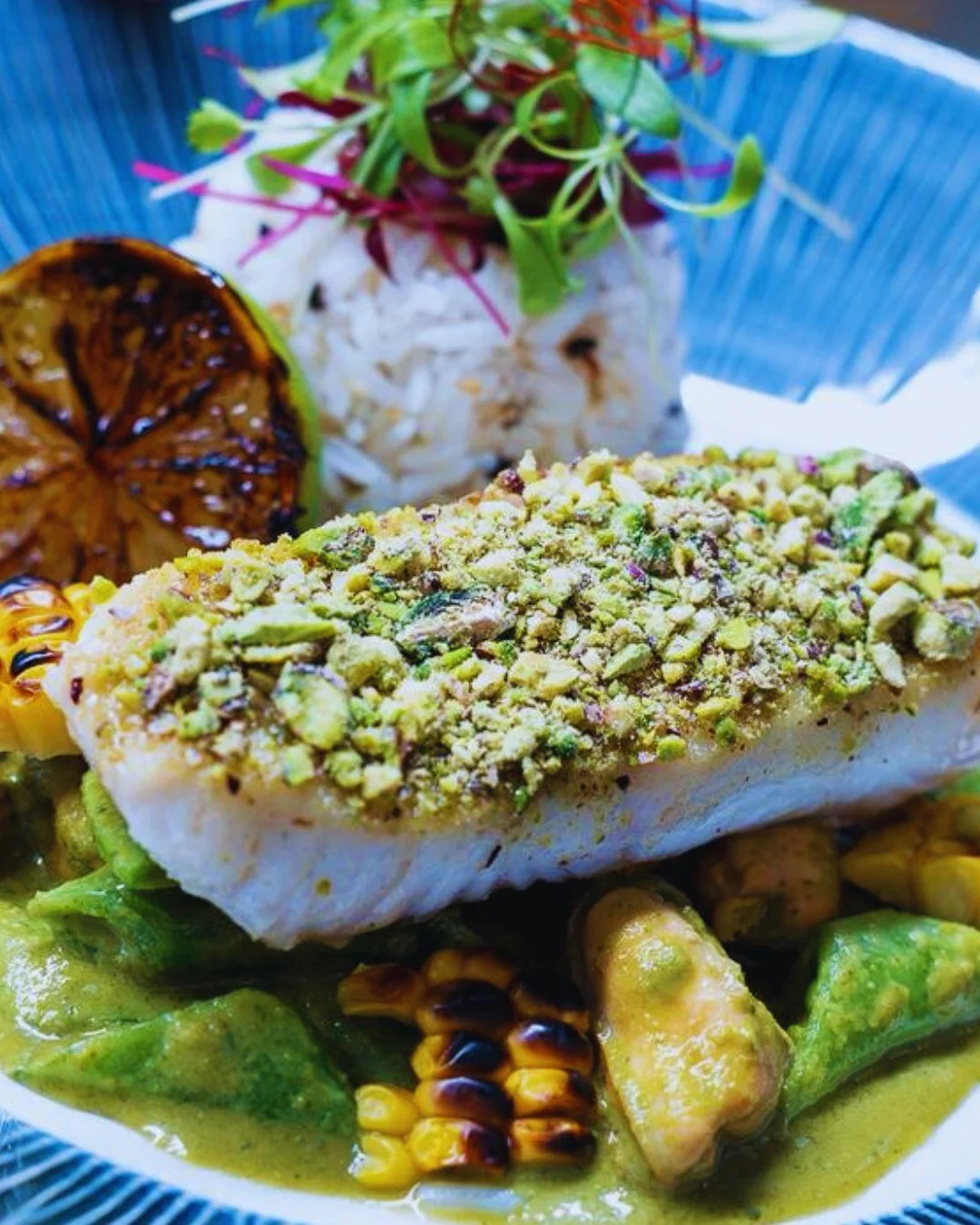 Rice and shine 🍚 

Wild Halibut with Pistachio Crust, Mussels, Charred Corn, Thai Basil, Lemongrass, Lime &amp; Coconut Fragrant Rice 

The pistachio crust that adds just the right amount of nutty crunch. 

Sea-salted mussels, smoky charred corn, an