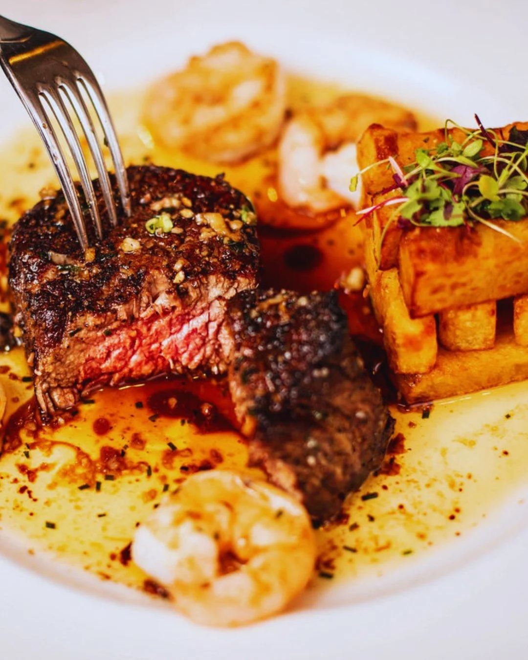 Wine not make it a steak night! 🥩🍷

Surf and Turf. Available Wednesdays. &pound;99 for two.

🥩 Two Scotch fillet steaks done just the way you like them
🦐 Jumbo king prawns
🐚 Scallop
🧄 Garlic butter
🍟 Gamba chunky chips

🍷 Plus, enjoy a bottle