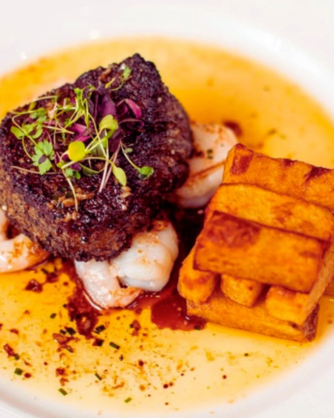 The perfect midweek pairing. 🥩🦐

Available every Wednesday, our Surf &amp; Turf is designed to be shared.

For &pound;99 for two, enjoy two Scotch fillet steaks served with jumbo king prawns, scallop, garlic butter and Gamba's chunky chips, accompa