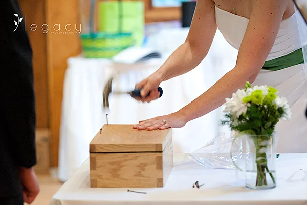  UNITY TIME CAPSULE – Nailing closed a Love Letters and Wine Time Capsule  photo ©    Legacy Photo and Design   