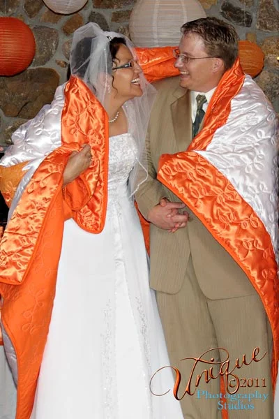  BLANKET CEREMONY – A Native American tradition to honor and protect the newlyweds  photo ©    Unique Photography Studios   