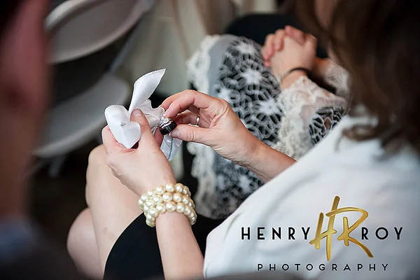  RING WARMING – Guests hold and bless your rings before you exchange them  photo ©    Henry Roy Photography   