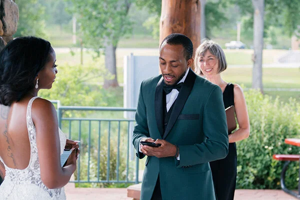  CELL PHONE VOWS – Fitting for a couple who spend months apart due to their careers  photo © Keenan Angel Photography  