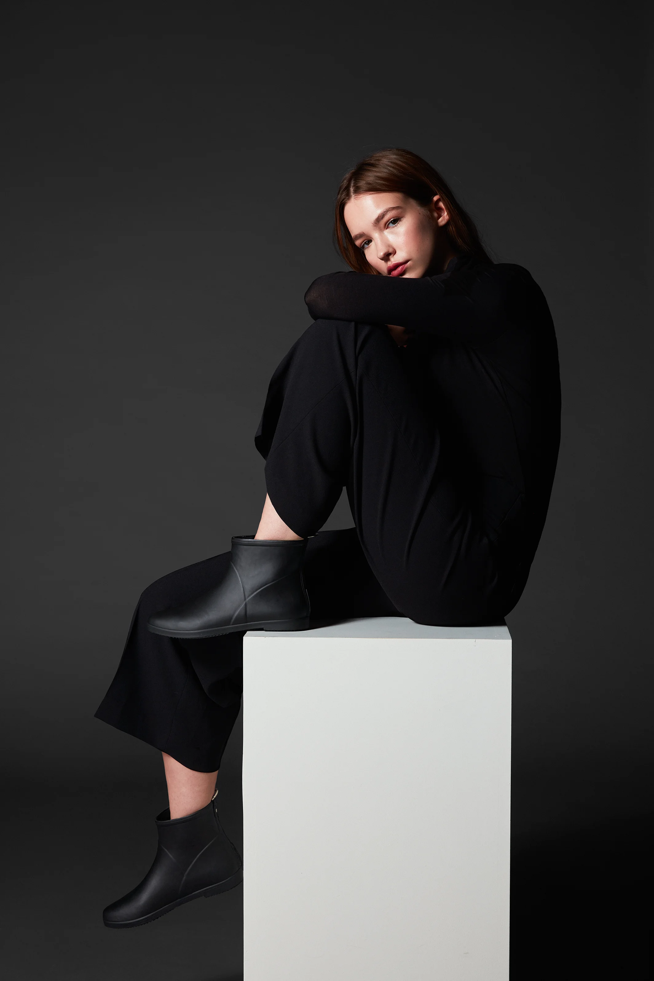 alice and whittles minimalist black ankle rain boot product photography
