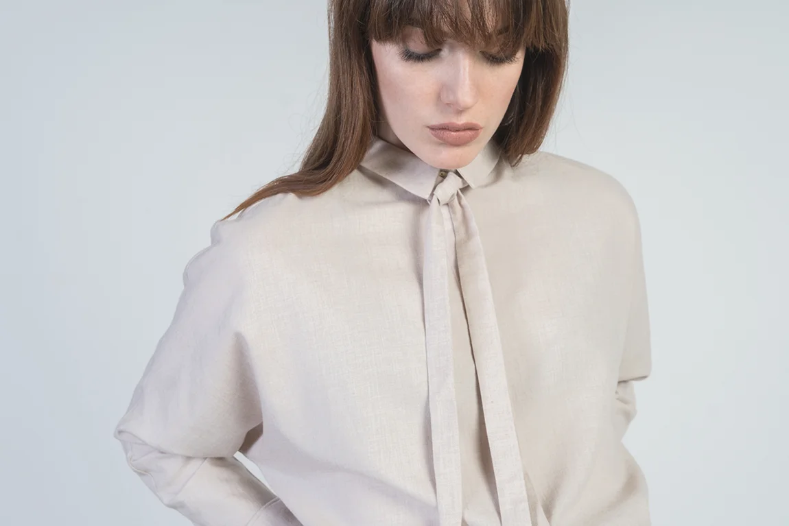jungle folk beige tiki bow blouse product photography