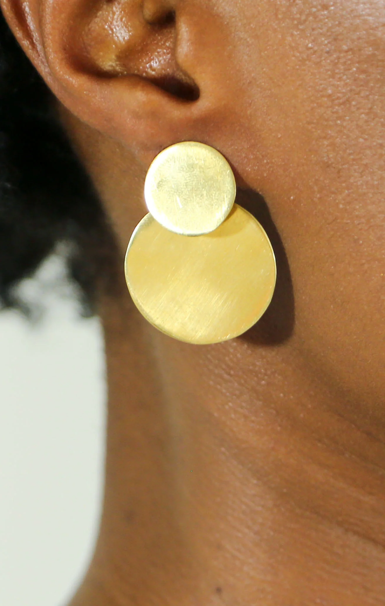 Smooth Coin Earrings Soko recycled brass artisan design made in kenya dress up womens accessories jewelry sustainable fashion product photography