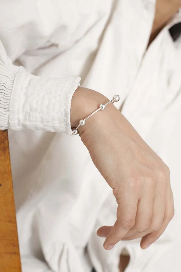 erin considine orbita silver cuff product photography