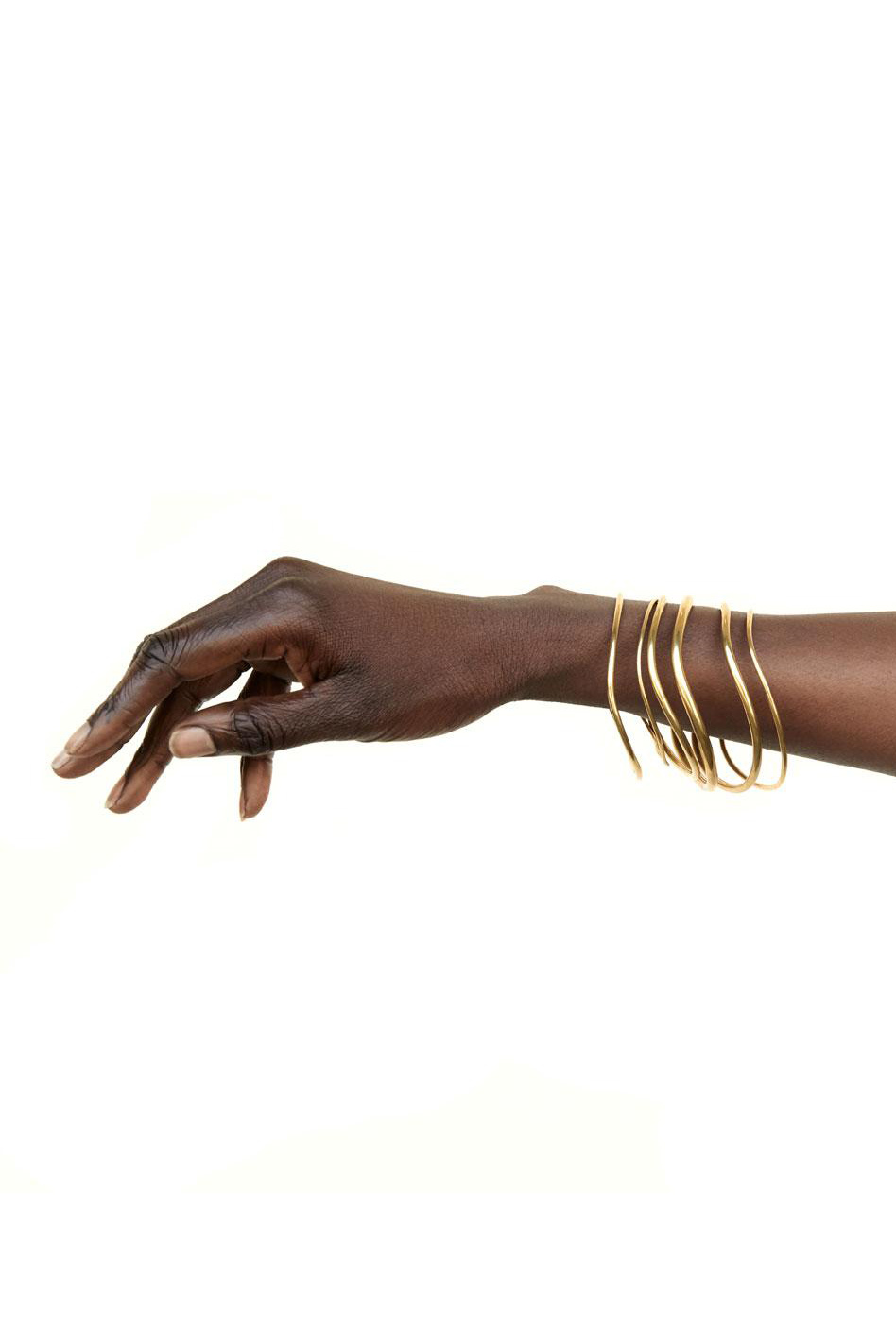 soko wavy bangle stack brass product photography