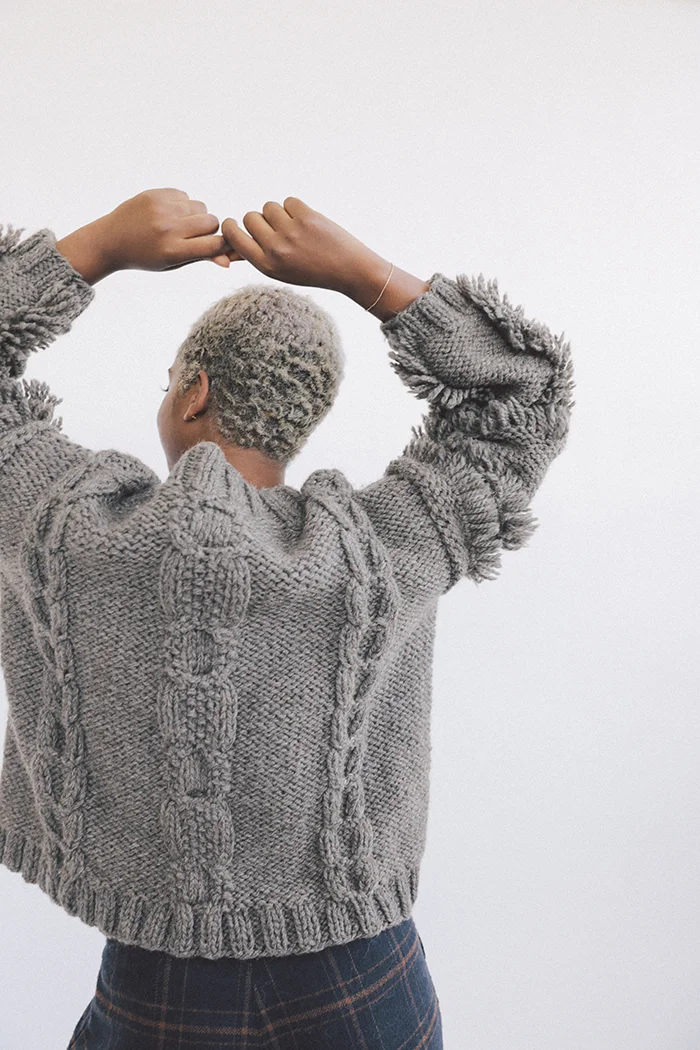 kordal alpaca eco wool fringe cable sweater fog grey sustainable fashion product photography