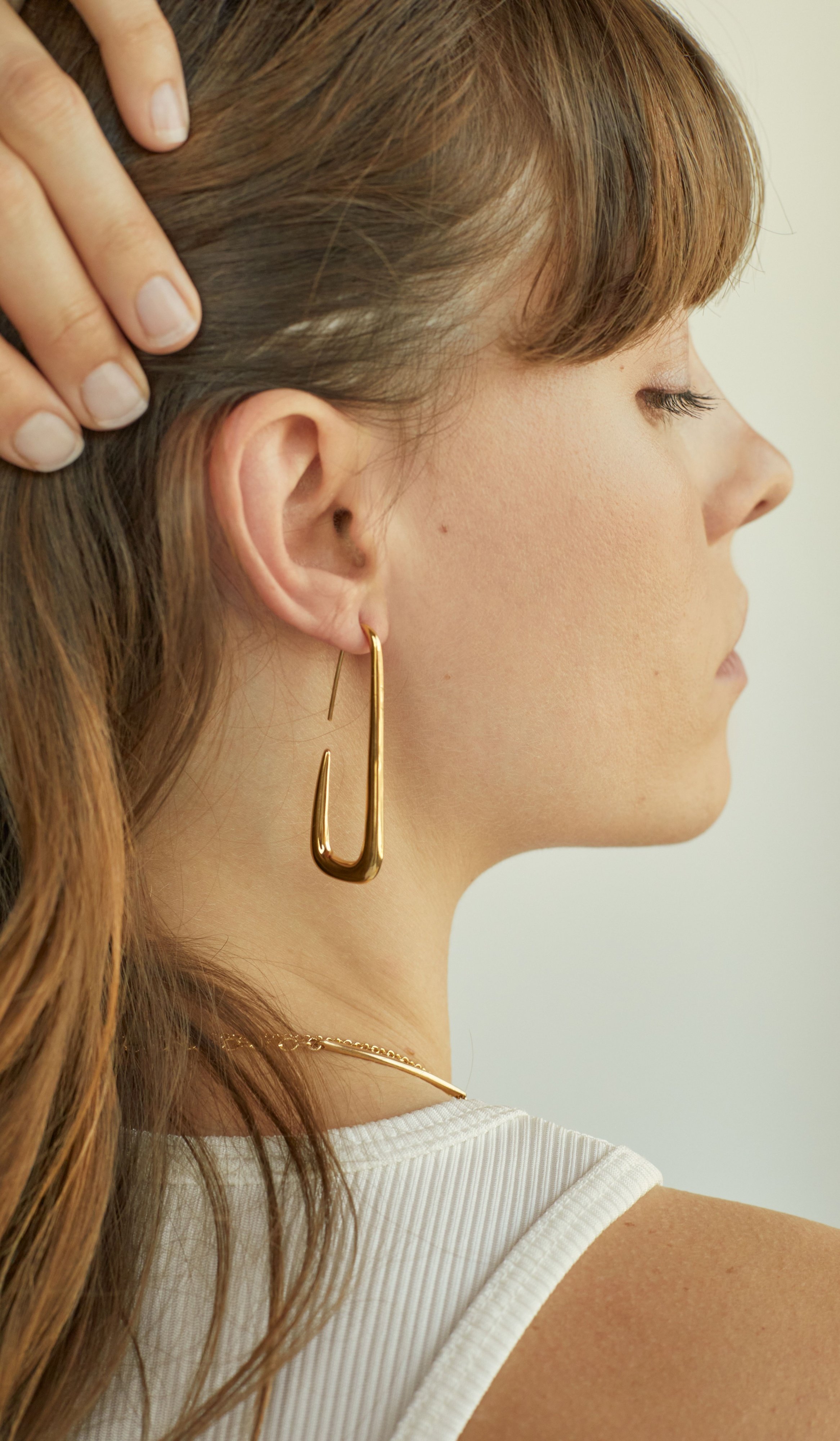 Soko laini threader earrings gold recycled sustainable responsible jewelry product photography