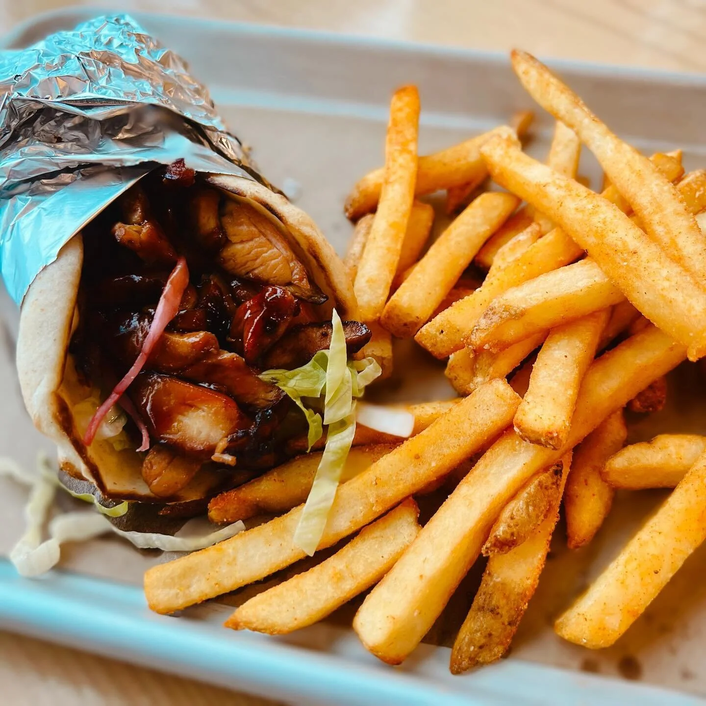 Lunch is Wrapped!

Teriyaki Chicken Wrap - Chicken thighs marinated in house made teriyaki, lettuce, tomato, pickled red onion, garlic aioli wrapped in a pita served with fries $16

Grab a $4 Pint of your choice when you order the chef special lunch 