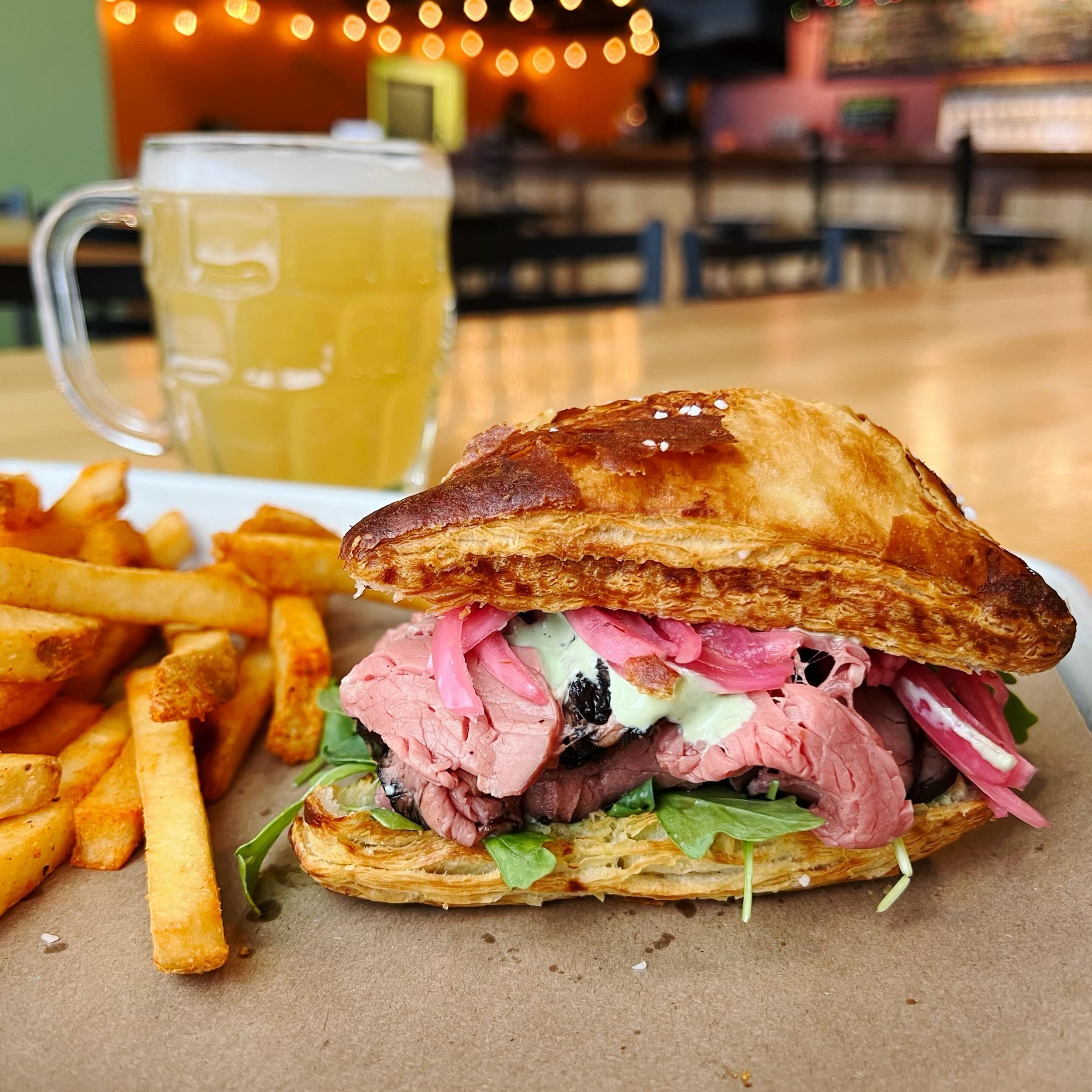 Best Roast Beef in Nashua, dare we say, Southern NH?! 

WTF: Italian Roast Beef
Medium Rare cooked Roast beef, Boursin cheese, pickled onion, arugula, basil horseradish sauce on a pretzel croissant with fries $16

Come give it a try and see!

🍺 Chef
