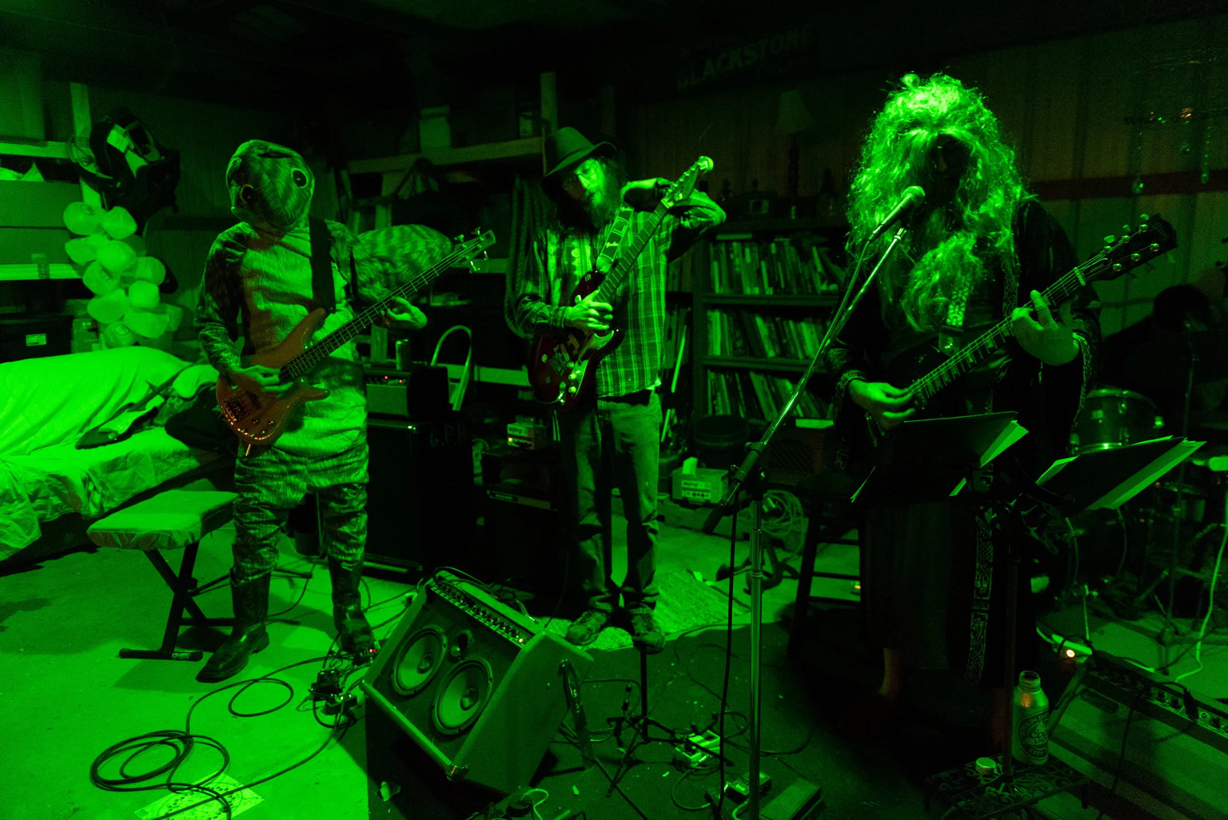 Nate with Taylor Rhyan (left) and Nate Corder (right) at their Halloween band practice. Their band meets in Corder's garage every Tuesday night.