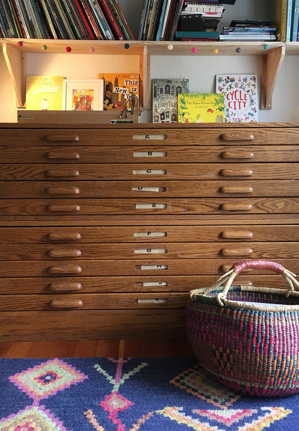 Flat file. Found this beaut on Craigslist, and thankfully it's in two parts for hauling up the stairs to my attic studio. It's great, and allows for some primo paper hoarding. 