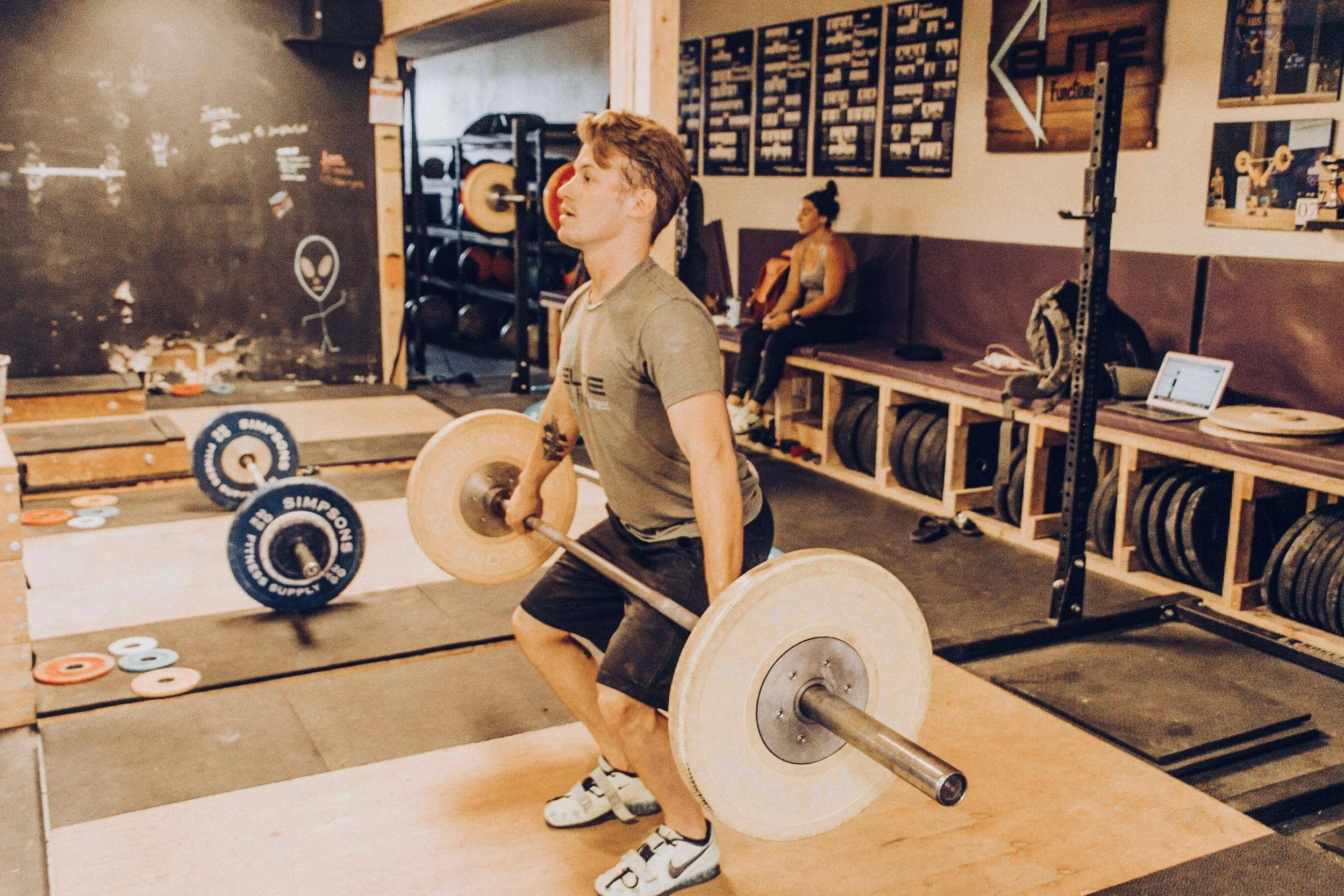 Incorrect Power Position: An athlete may get to a position similar to this if the athlete attempts to lift around the knees and elevate the torso too quickly.