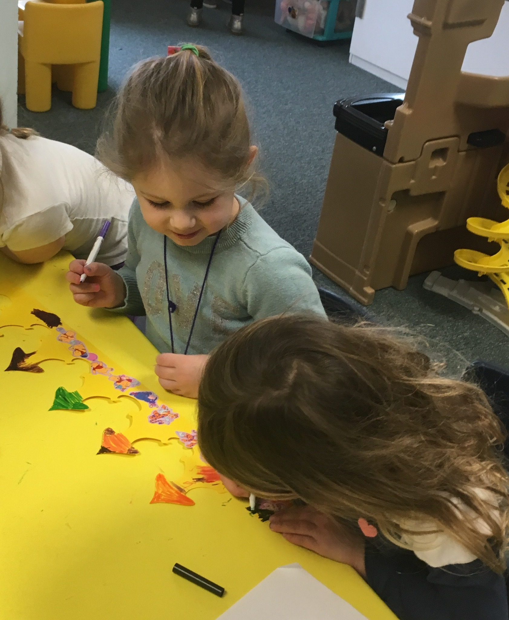 Mrs. Murray's Nursery School - Children working together