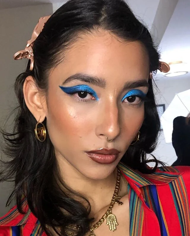 UZI LOOKS on the queen herself @angelicauzi x @angelicauzijewelry 
Using the @colourpopcosmetics blue moon palette, @narsissist orgasm creme palette, @kkwbeauty lip liner 🥶🥶🥶 #missmomua