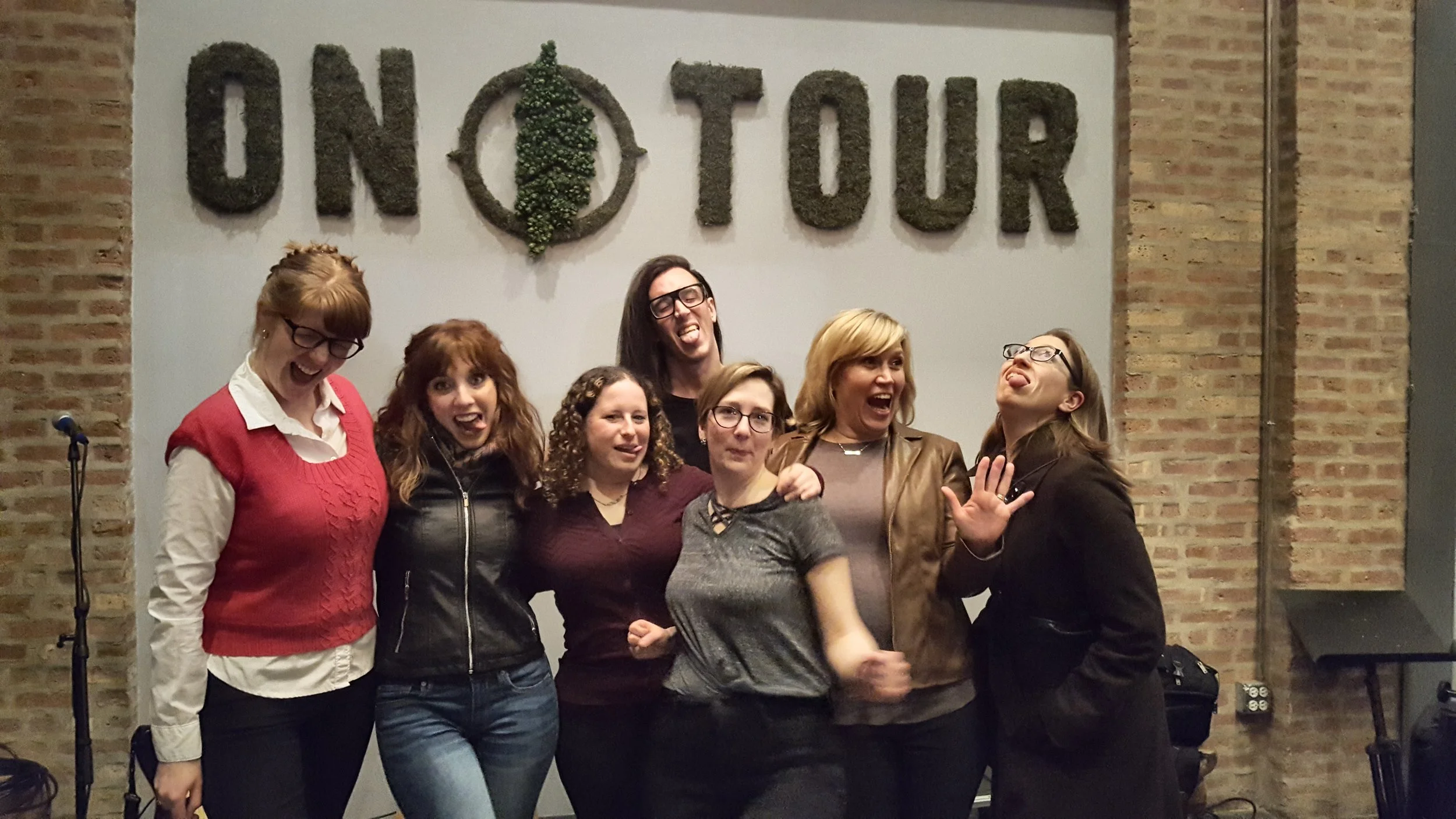 From left: Megan Grandstaff, Jackie Mantey, Jessica Katz, Wesley Fuentes, Christina Brandon, Elaine Quinn, Elisa Luth. (Not pictured: reader Mona Luan and guest co-host Mindy Watters).