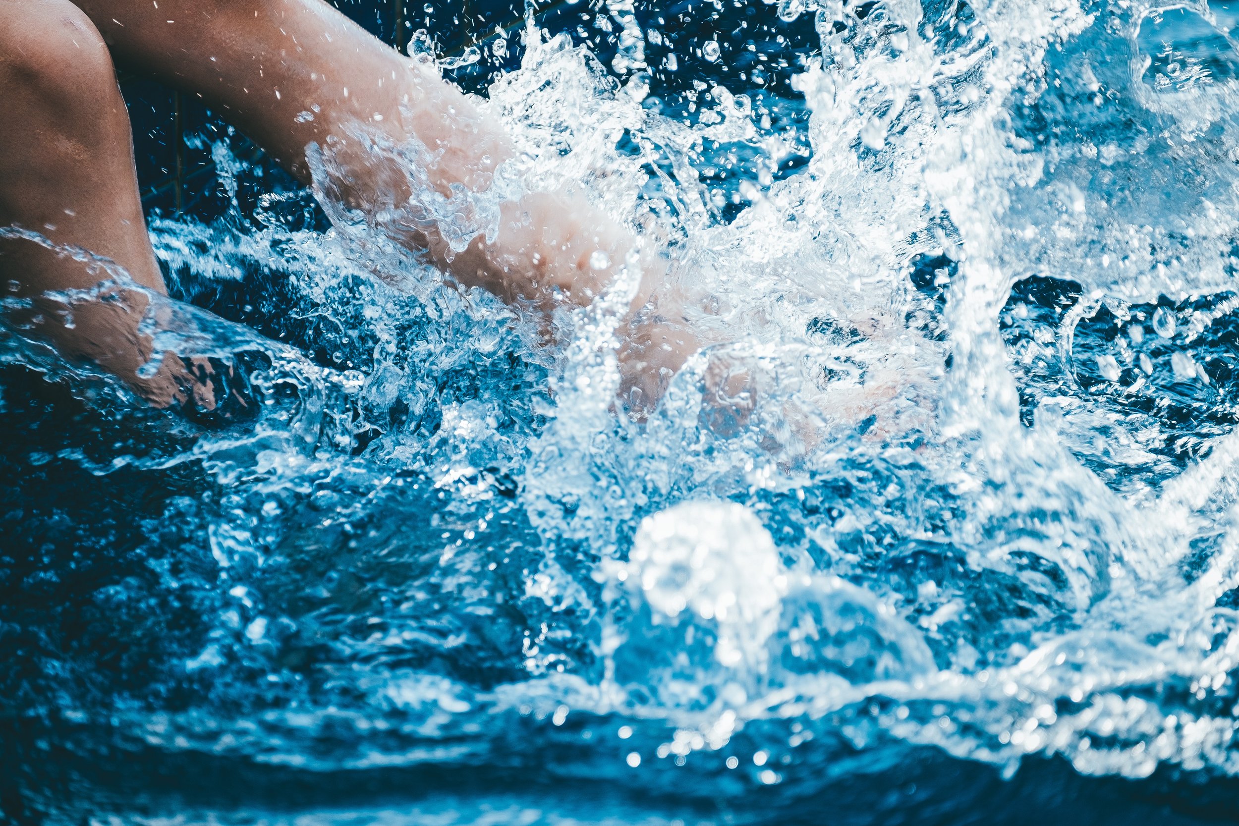 nudist young adult swimming