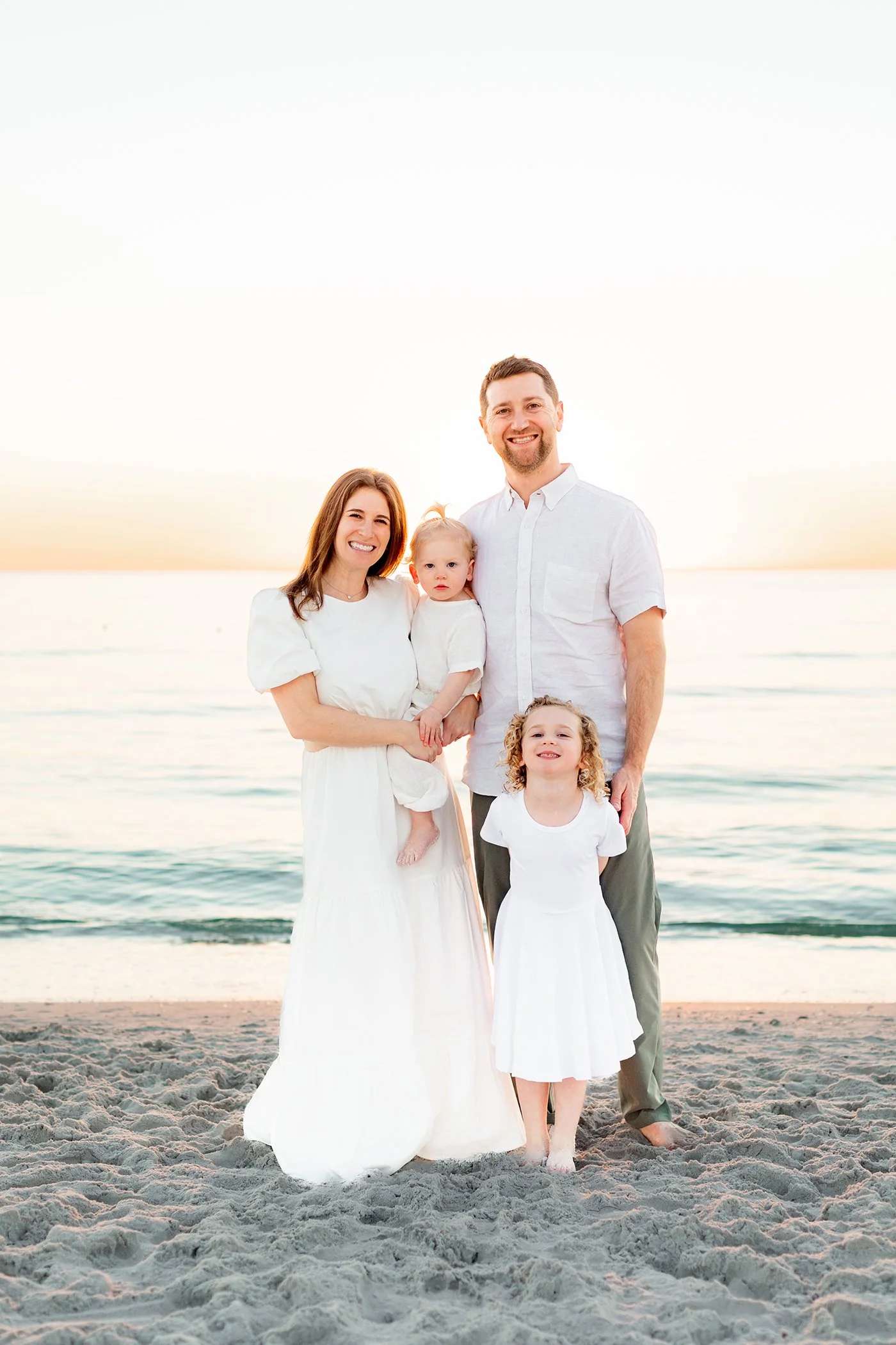 Family Session with a Surprise Announcement at Madeira Beach, Florida