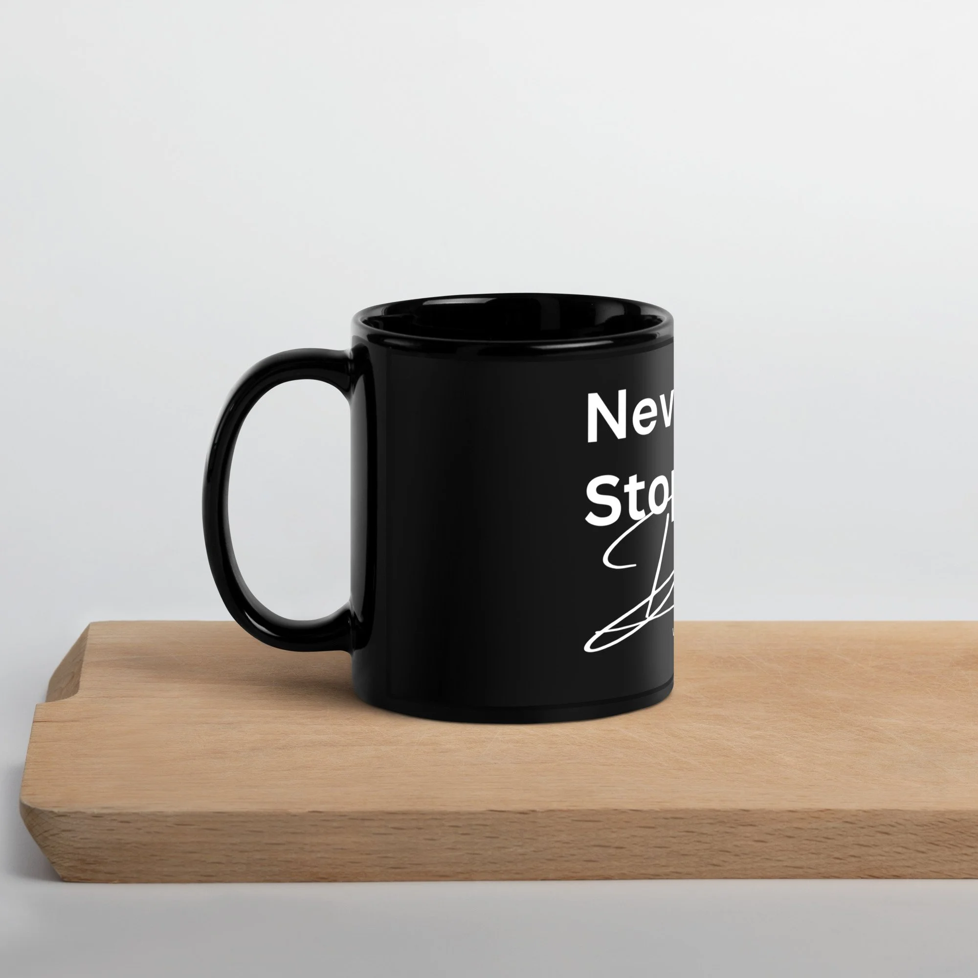 black-glossy-mug-black-11-oz-handle-on-left-655de6c511cc2.jpg