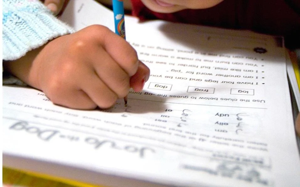 Hand Working On Math Homework