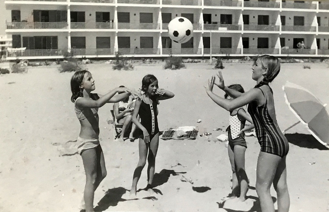  Clare, Rebecca, Anna and a friend playing volley-ball on the beach. 