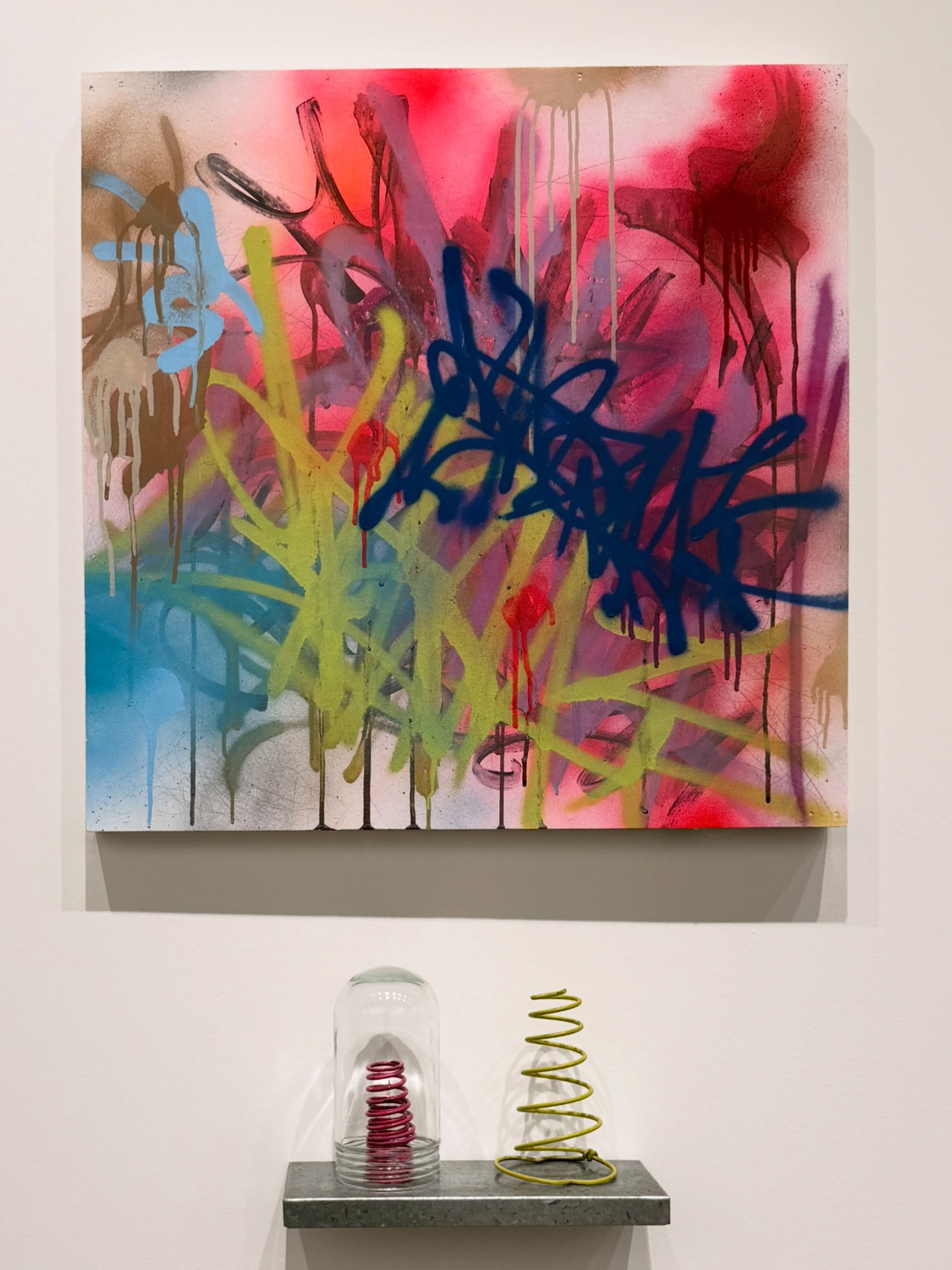 &ldquo;To See Her Smile&rdquo;
Samuel E V&aacute;zquez
Acrylic, spray enamel, ink, dye on board, 2011,
with assemblage by Joanna Nixon.

On view in the Katharine  B Sutphin Gallery as part of &ldquo;From the Collection of&hellip;&rdquo; exhibit.