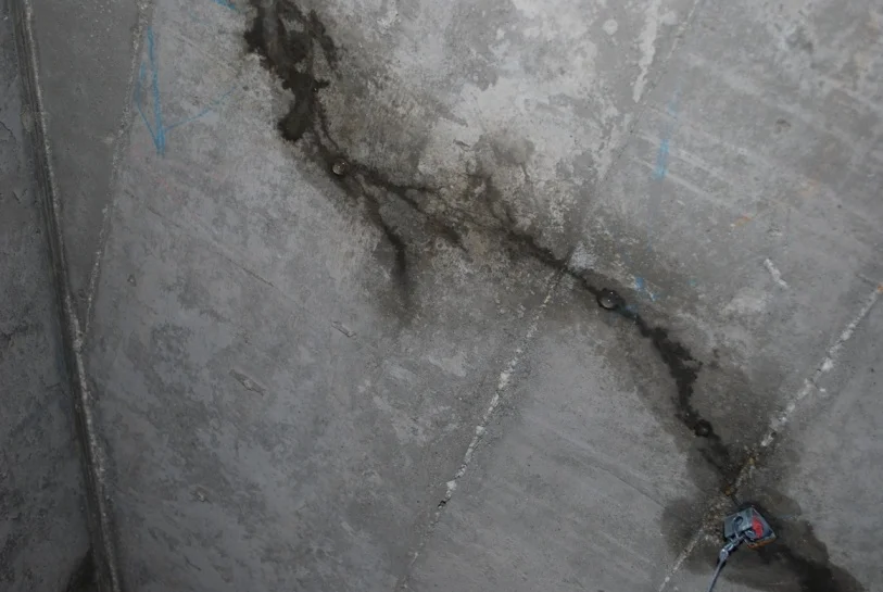 Figure 1: Despite the presence of a waterproofing membrane on the elevated concrete slabs, water intrusion occurred through the terrace levels into the spaces below, infiltrating via penetrations and cracks in the slab.