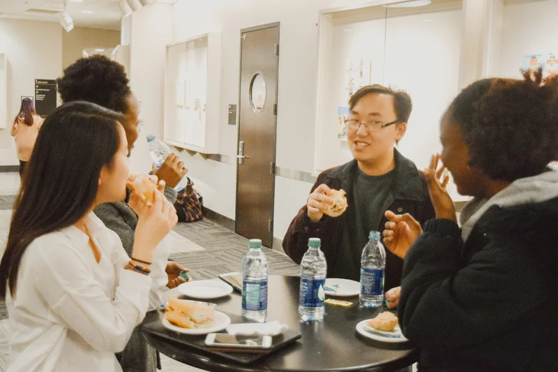 Discussion moderator Jenny Tam (left) discusses the Crazy Rich Asians: Film Showing & Discussion event with attendees.