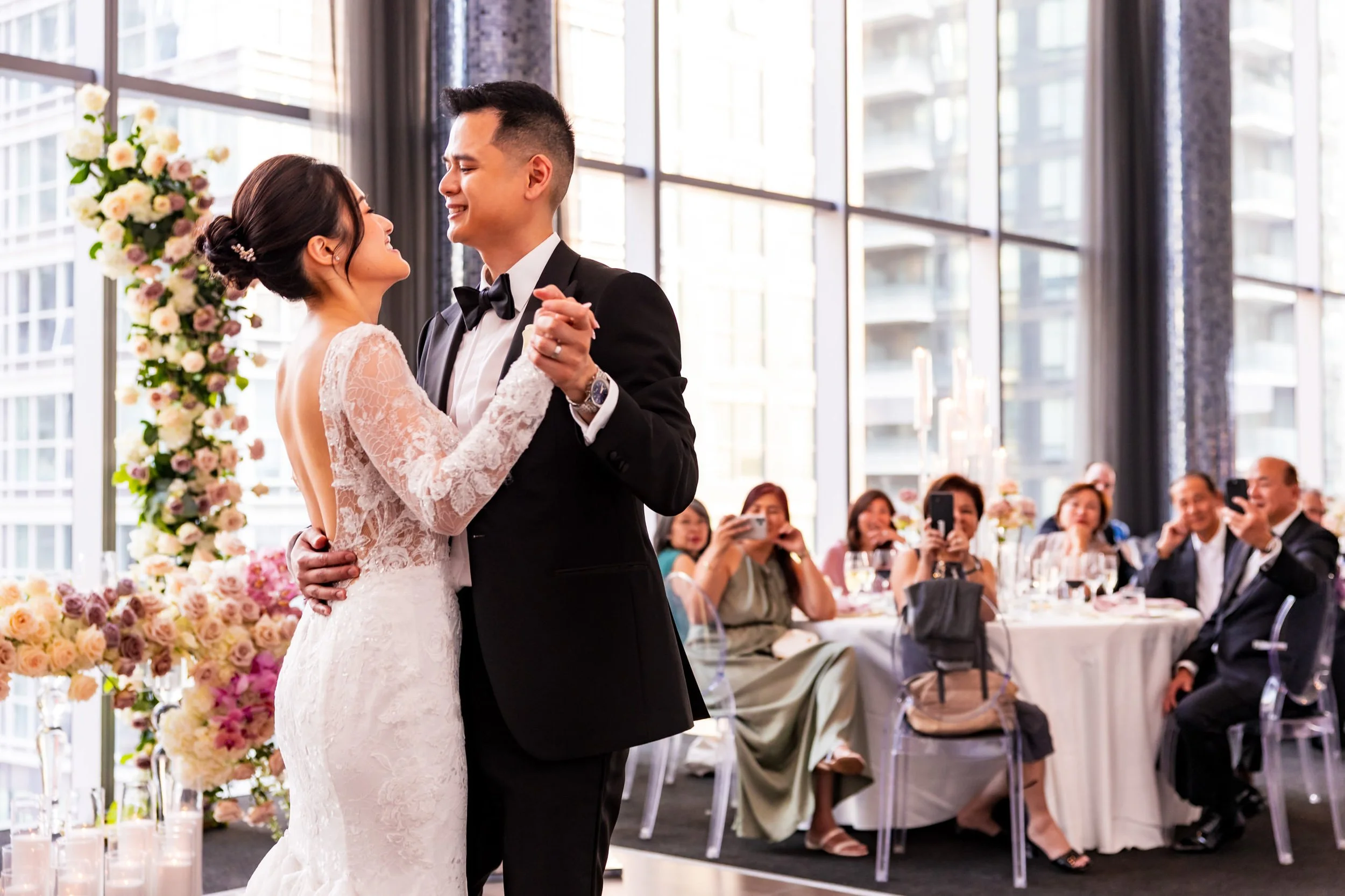 Bride and groom sharing their first dance at Malaparte wedding venue in downtown Toronto
