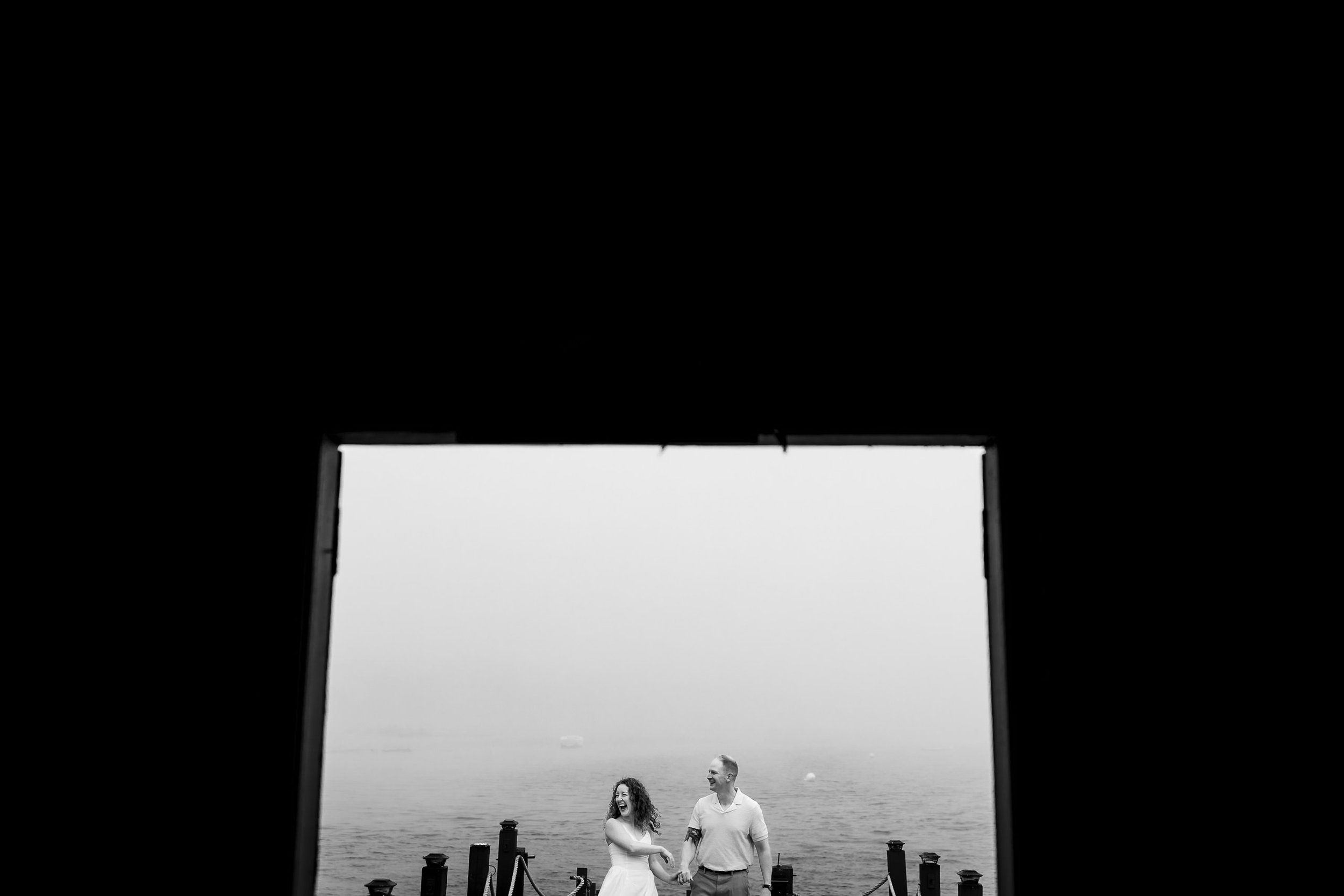 Black and White Waterfront Engagement Portrait