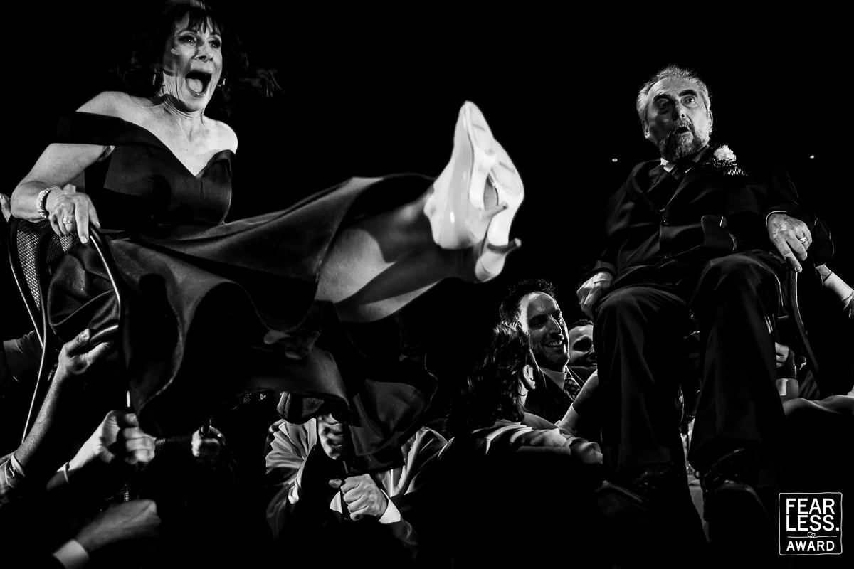 wedding reception chair lift crazy moment fearless award candid wedding photography