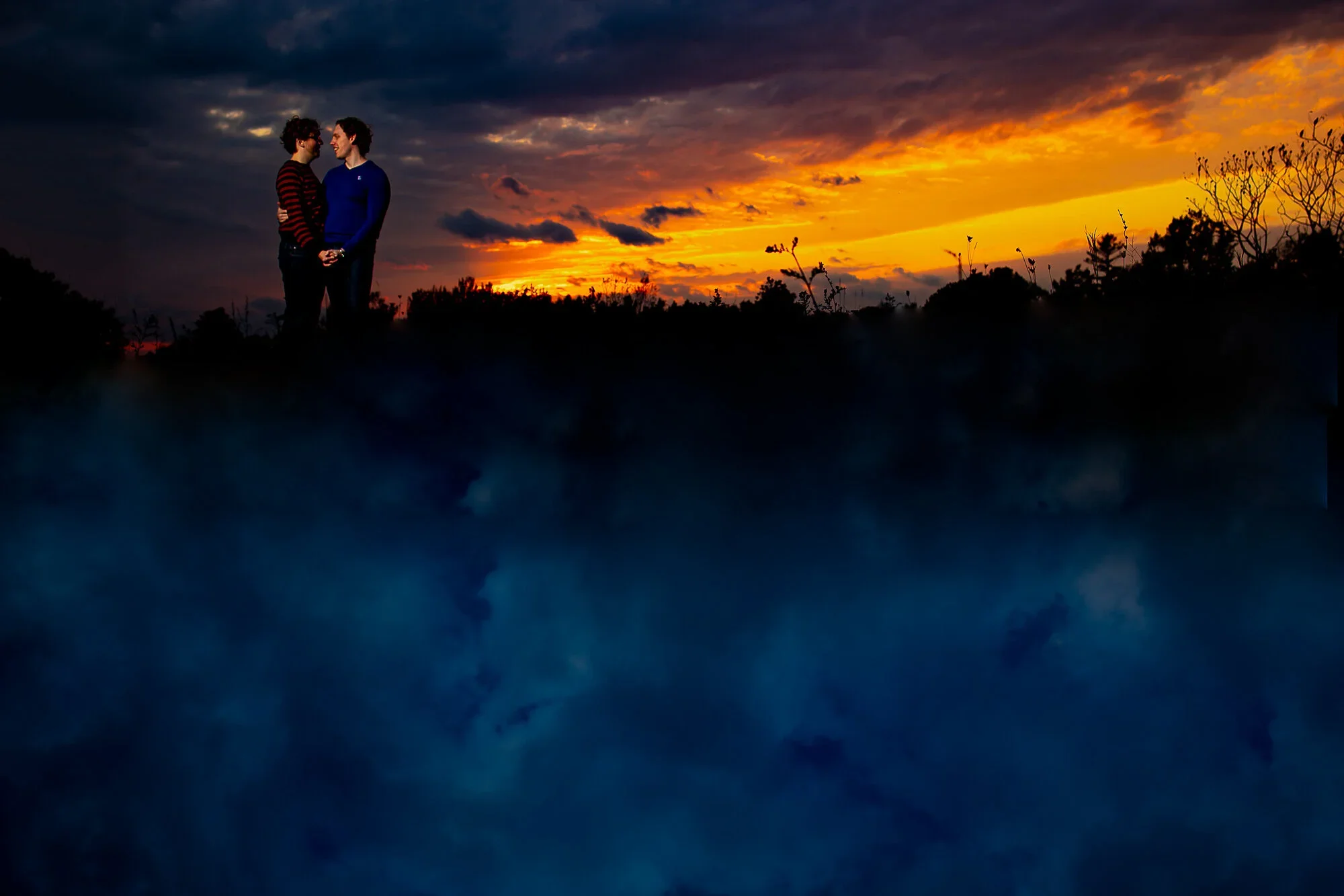 queer couple silhouette at sunset engagement session Rouge National Urban Park Toronto