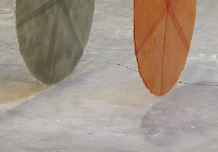  Set (2014), detail of two discs grazing the floor, pigmented resin, c clamps and steel, 40 x 80 x 160 inches (1 x 1.5 x 4 m)  