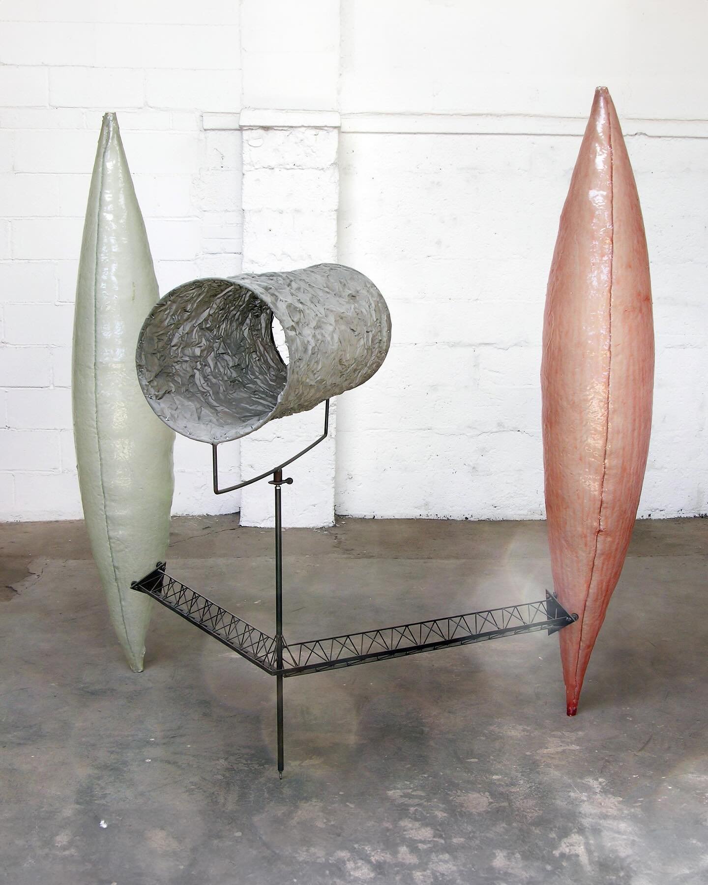 Stand Off 2005
6&rsquo;x 4&rdquo; x 5&rsquo; 10&rdquo; x 6&rsquo; 2&rdquo;
fiberglass, steel, stainless steel fabric, bearing
cylinder can be spun

#tombutter 
#artofthetwothousands
#abstractsculpture