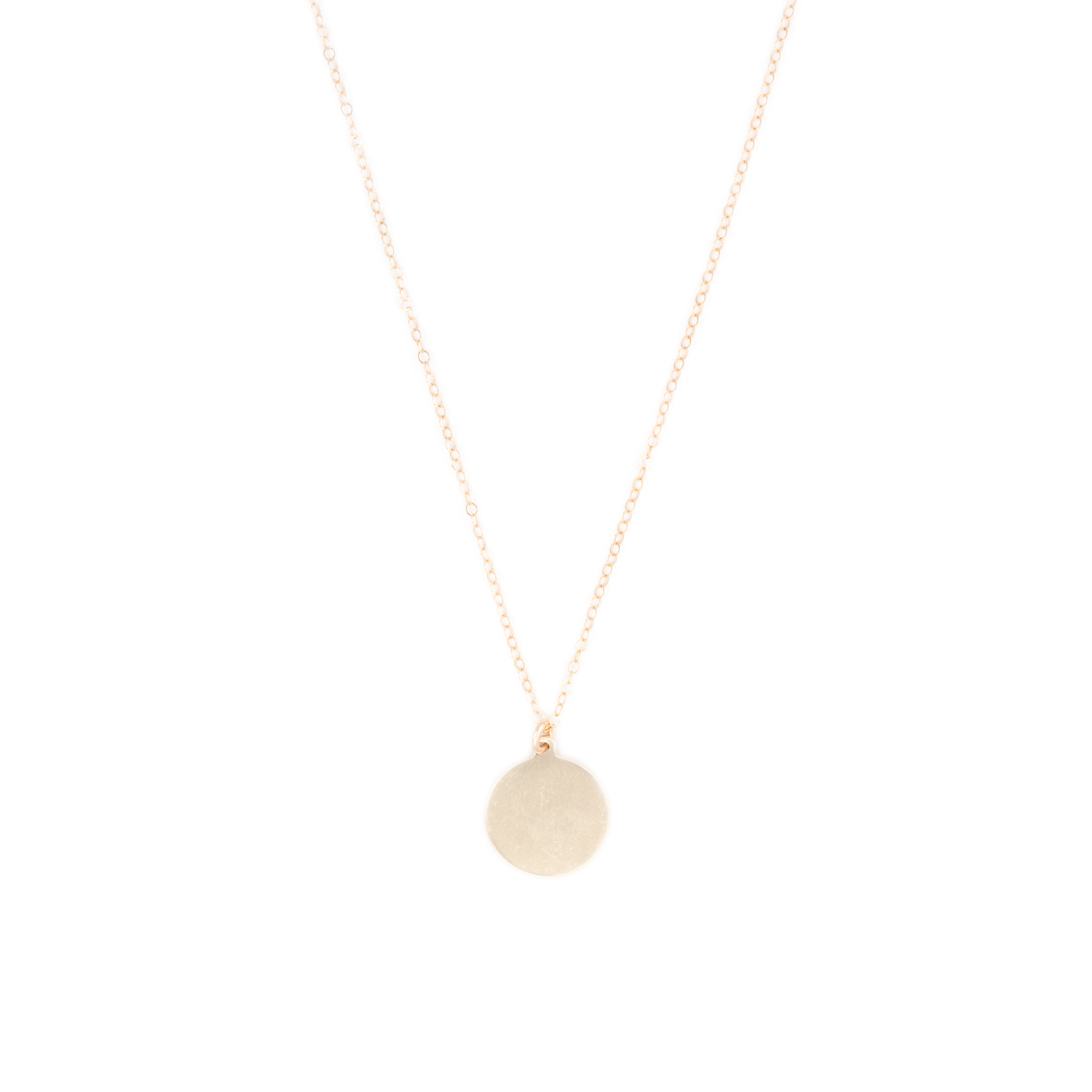 Stunning simple golden disk pendant on a golden chain