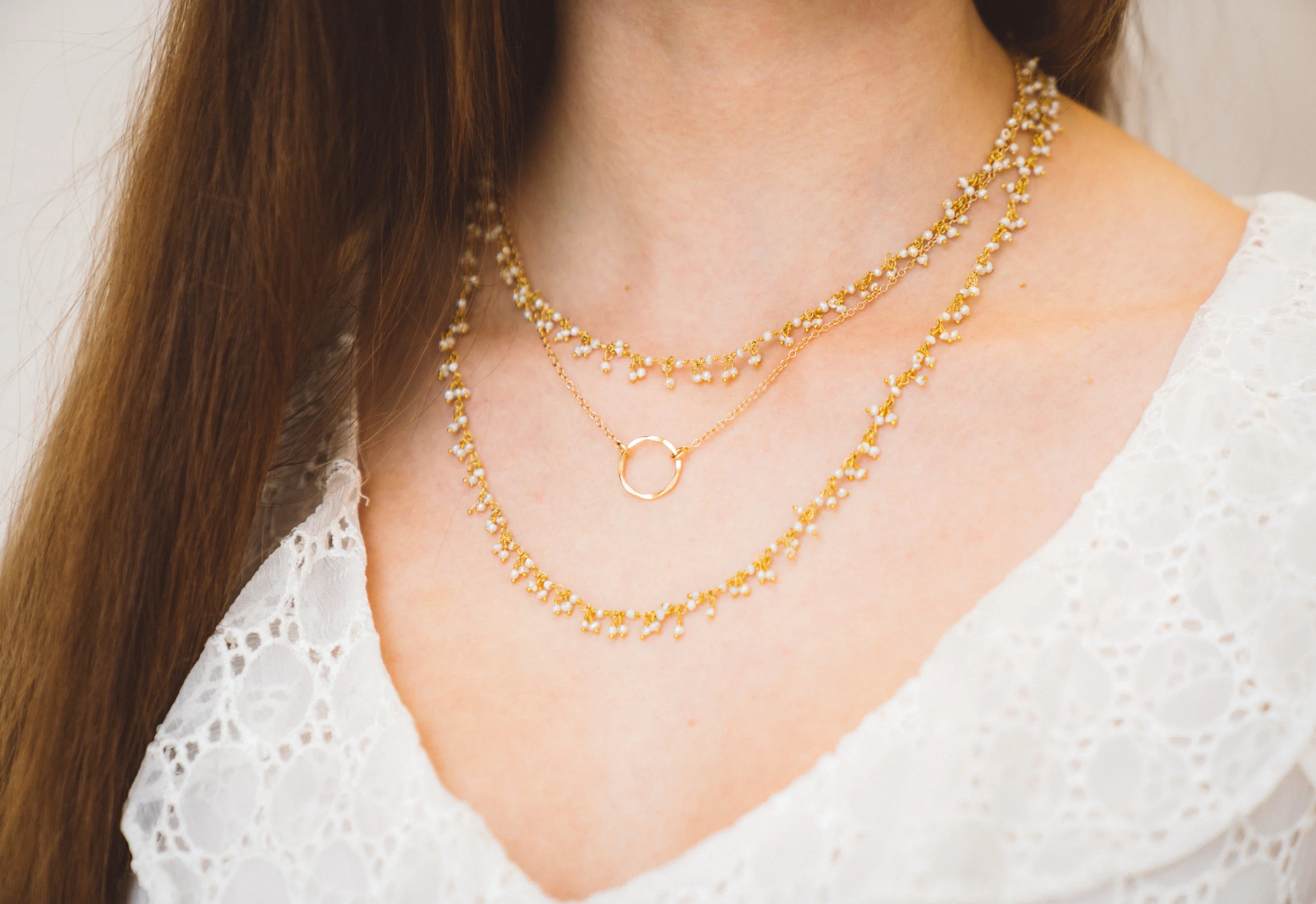 Sterling silver necklace falls at the collar bone