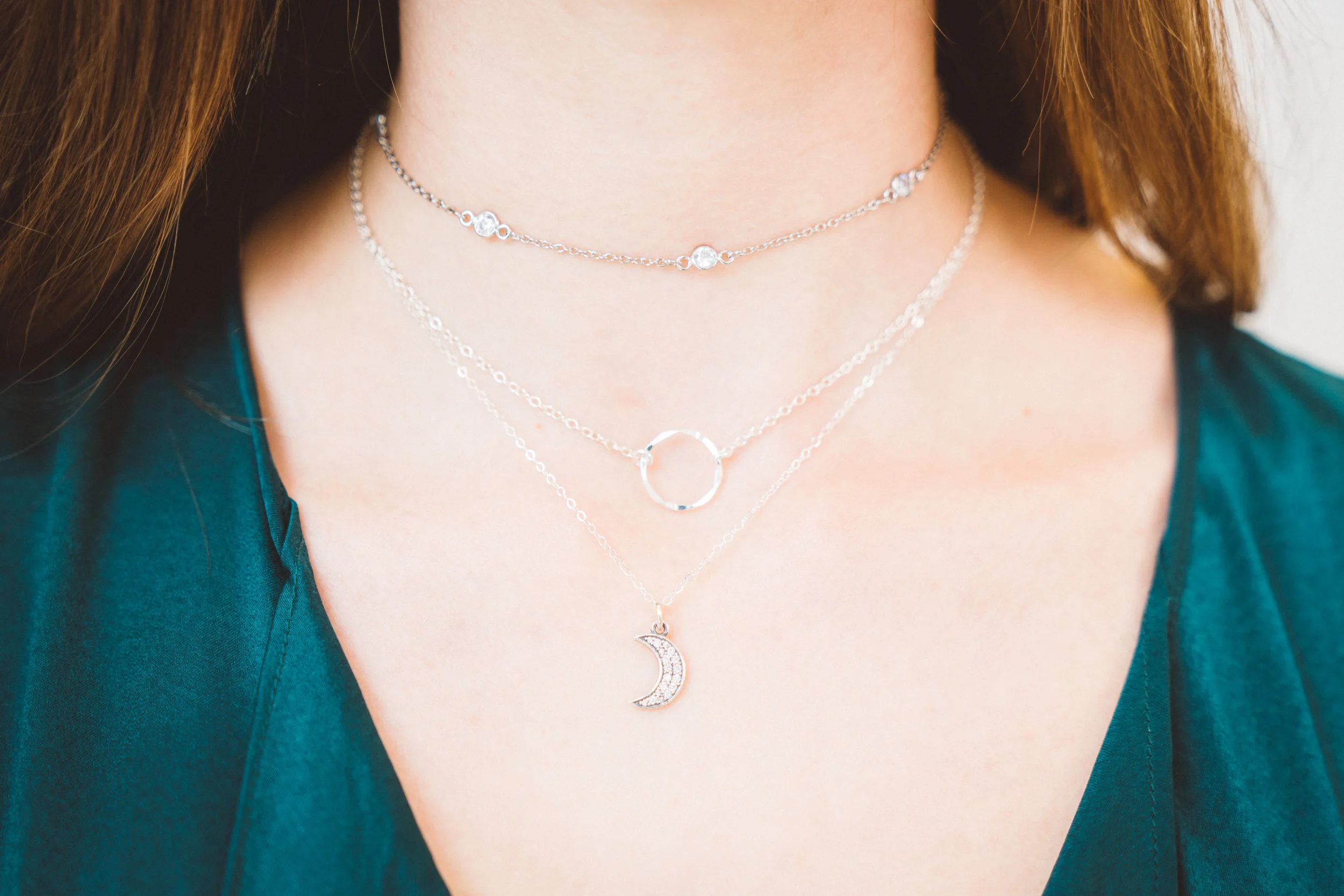 minimalistic sterling silver and crystal crescent moon pendant