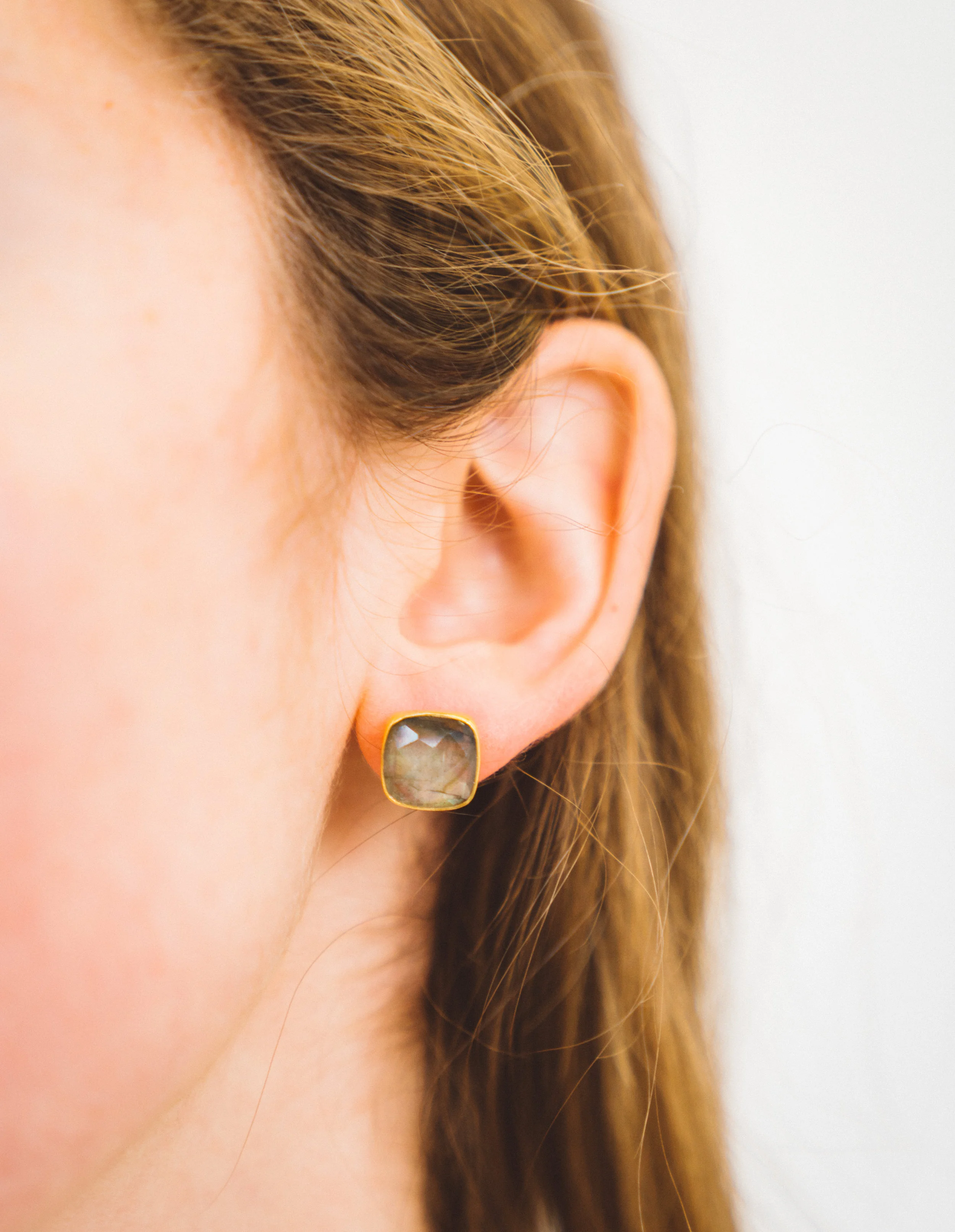 square labradorite stud earrings in a 24k gold frame