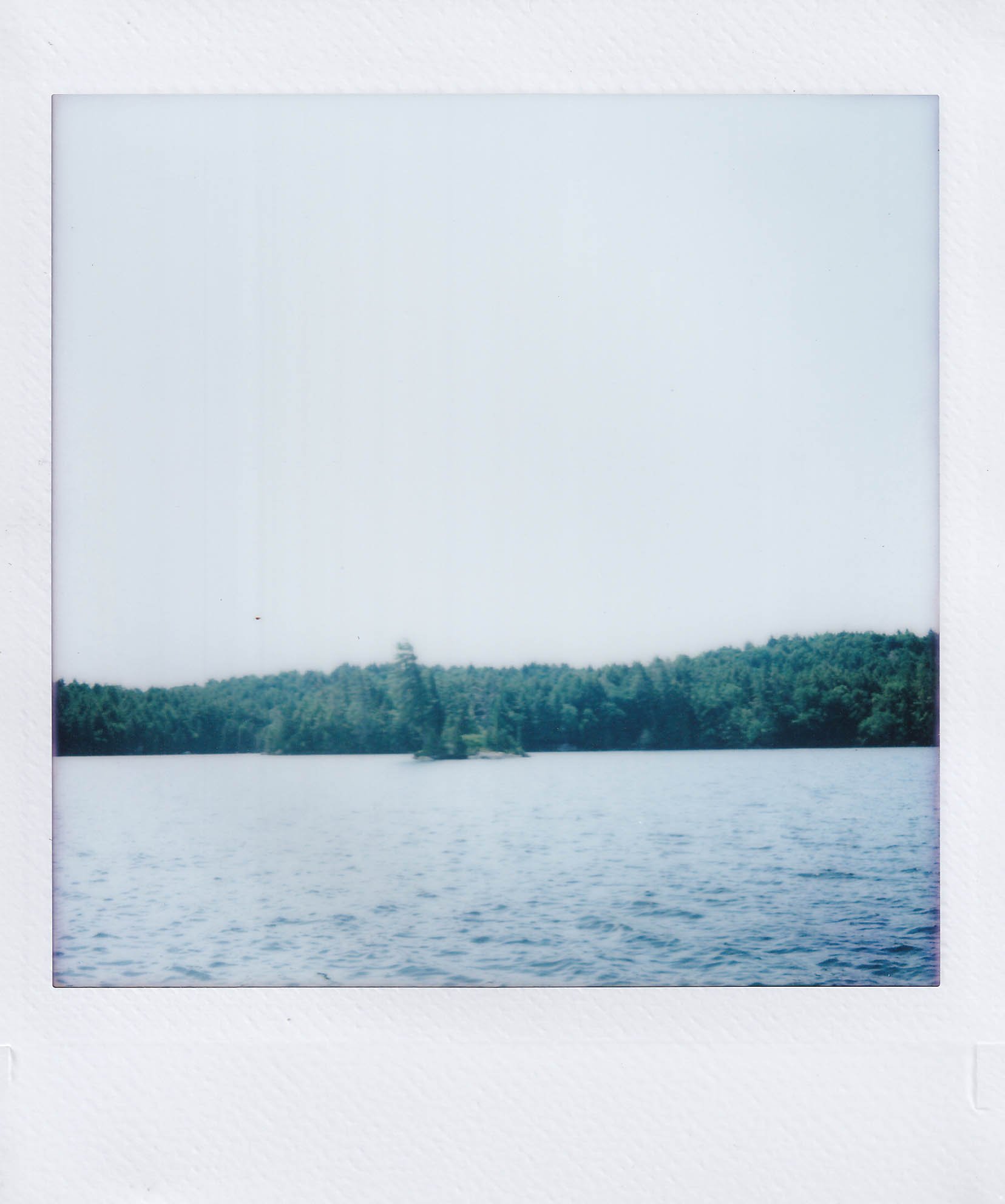 saranac lake, canoeing with anna, friday, 7-4-25.jpg