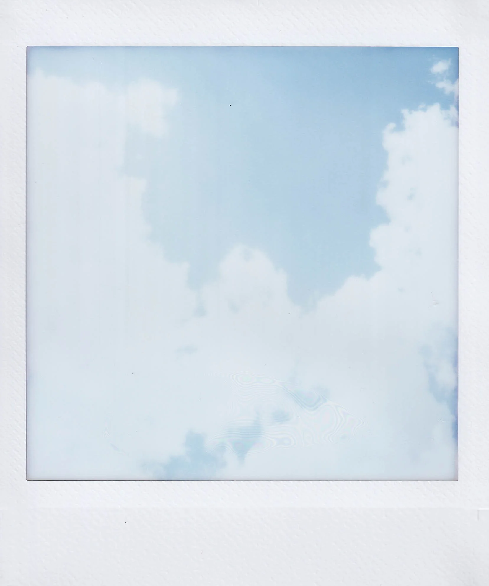 clouds, overexposed, walking around the lake at my mom's with cooper and mu, taking care of my mom's cats, after talking to anna, saturday, 7-26-25.jpg
