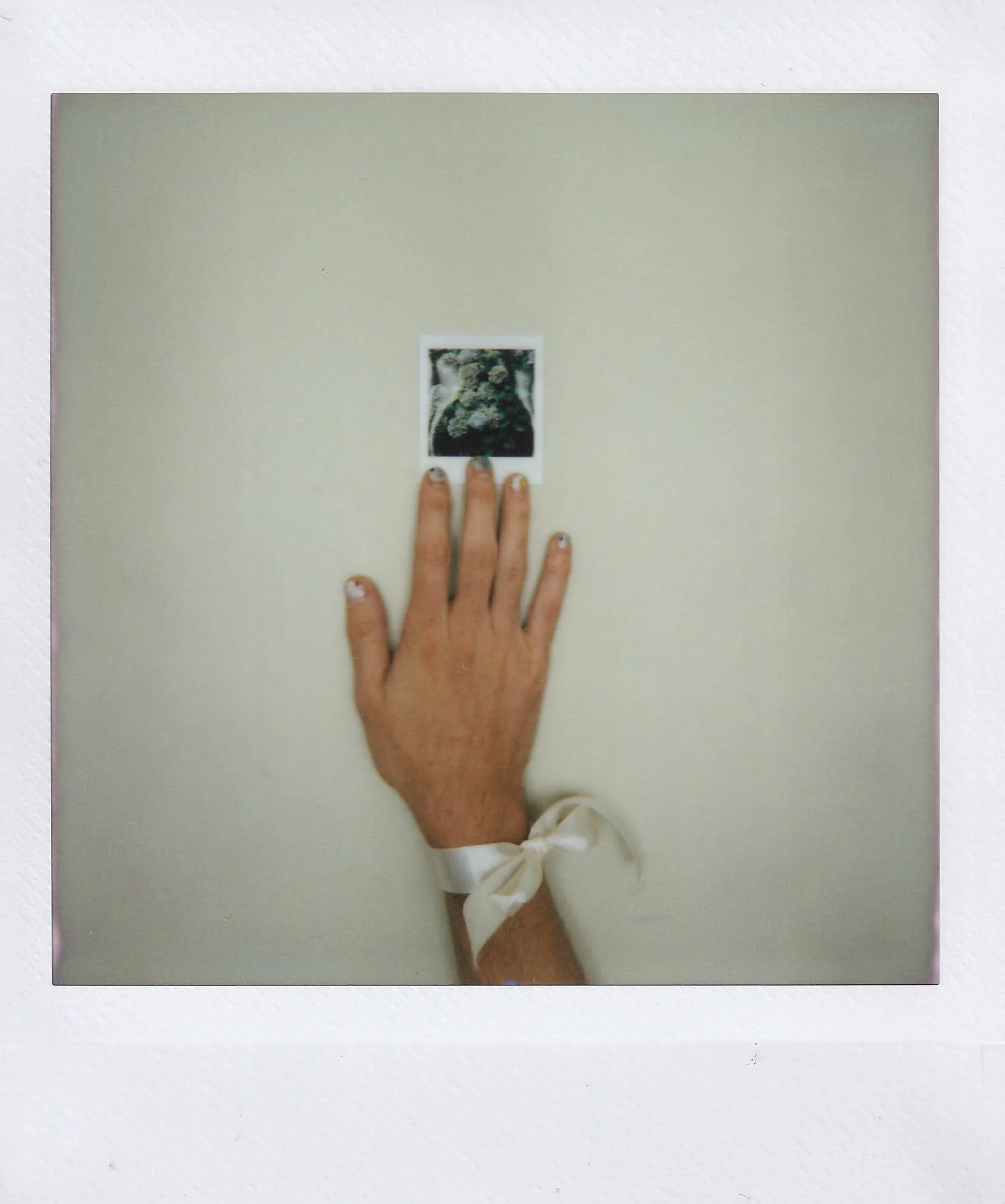 my hand 4,, with a picture of hydrangeas from france 2024, with a ribbon, that i bought from scraps, in my studio at my place, saturday, 8-23-25.jpg