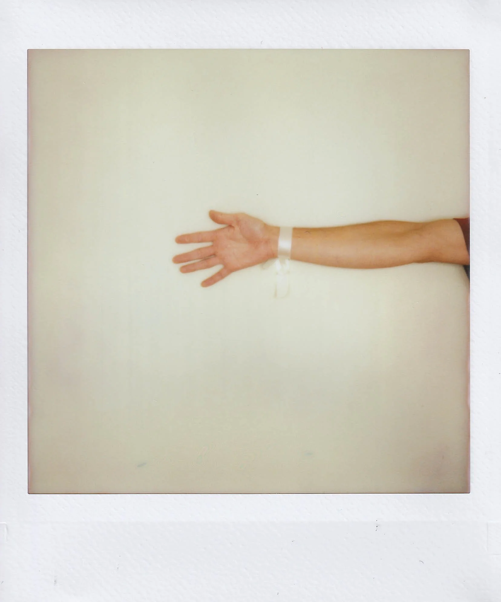 my hand 1, with a ribbon, that i bought from scraps, in my studio at my place, saturday, 8-23-25.jpg