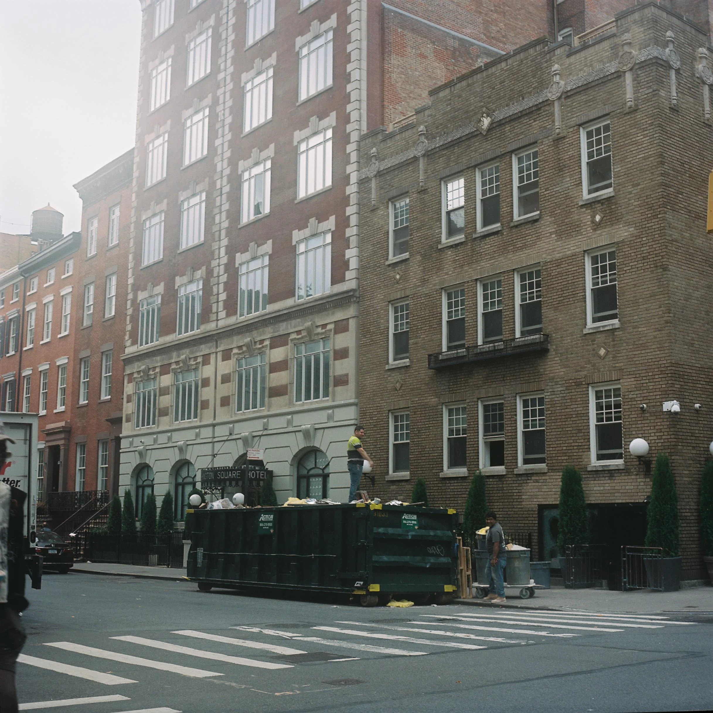 guy on top of dumpster, waverly and macdougal, before going to nyu reading at lillian vernon house, september 2026.jpg