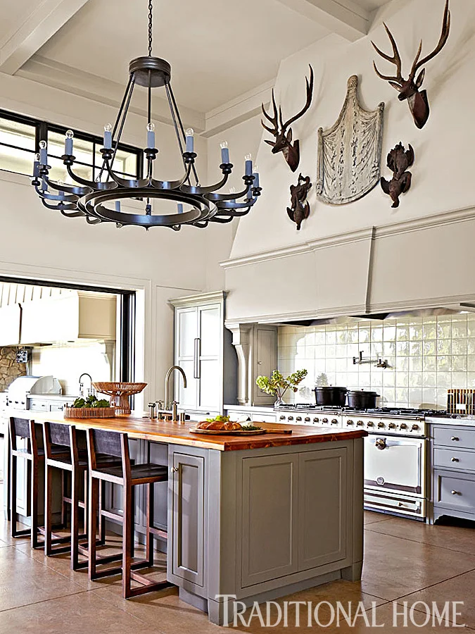 A chateau-style mantle range hood idea perfectly suited to the Napa countryside. Source: Hillary Thomas Interiors and Traditional Home