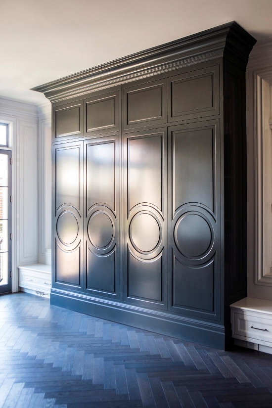 Circular cabinet door styles on the custom cabinetry designed by Leo Designs Chicago.