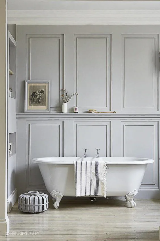 We need more paneled bathrooms in this country. Nothing evokes a sense of luxury and refinement quite like a beautifully paneled master bathroom. I love the minimalist take on this one, with no need for a window over the tub. See more Master Bathtub Ideas. #luxurybathrooms, #traditionalbathroom