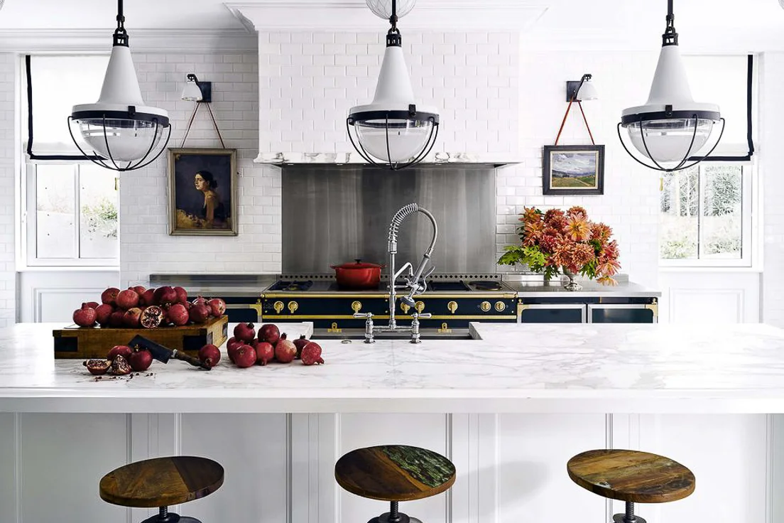 I predict that we’ll see more tiled range hoods in traditional and transitional kitchens this year. When the idea is used well, the range hood practically disappears, allowing other design elements to take center stage, such as the Black La Cornue French range in this kitchen by Ken Fulk. Kitchen Trends 2019. #kitchentrends, #luxurykitchens, #kitchendesignideas